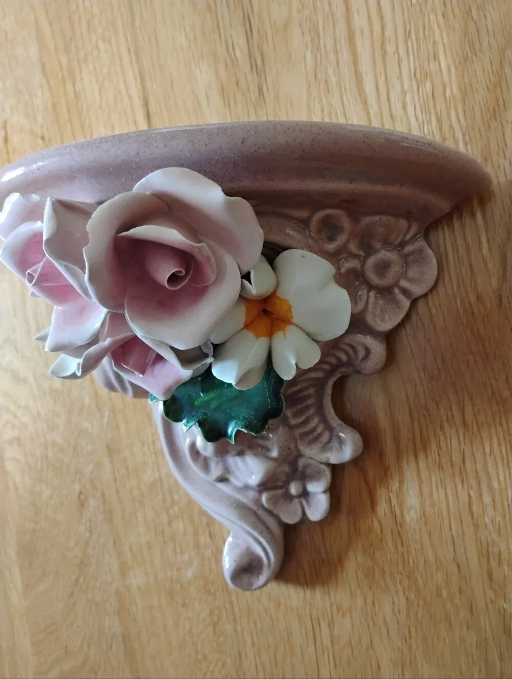 Pink Ceramic Wall Shelf with Floral Accent
